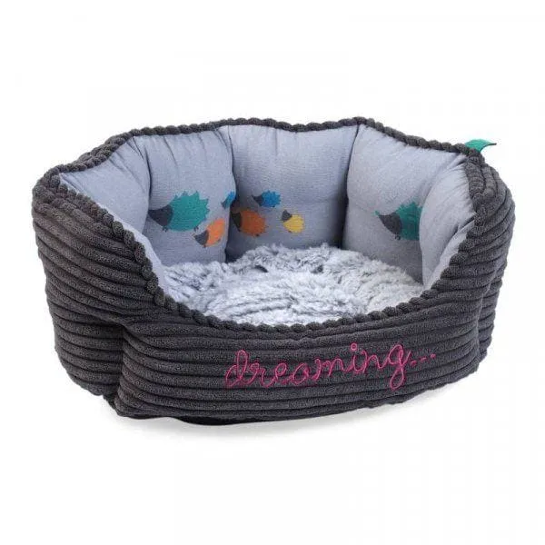 Hedgehog Dreaming Oval Dog Bed